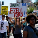 Demonstrators march in downtown Los Angeles in August 2014 protesting the fatal shooting by police of Ezell Ford, 25. Several hundred protestors rallied in front of the Los Angeles Police Department headquarters to denounce police shootings in Los Angeles and Missouri.
Kevork Djansezian/Getty Images
